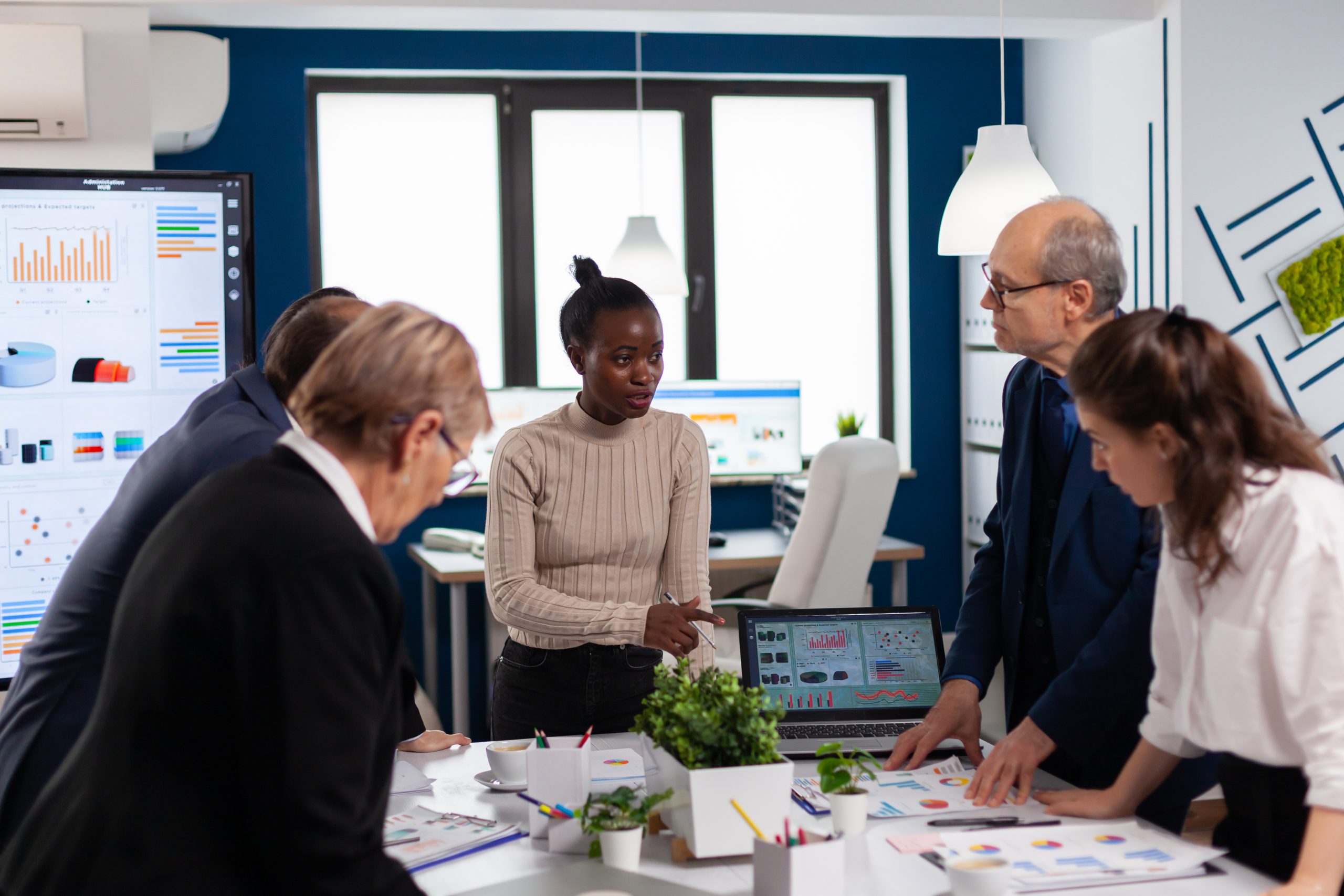 Diverse colleagues businesspeople discussing company issue